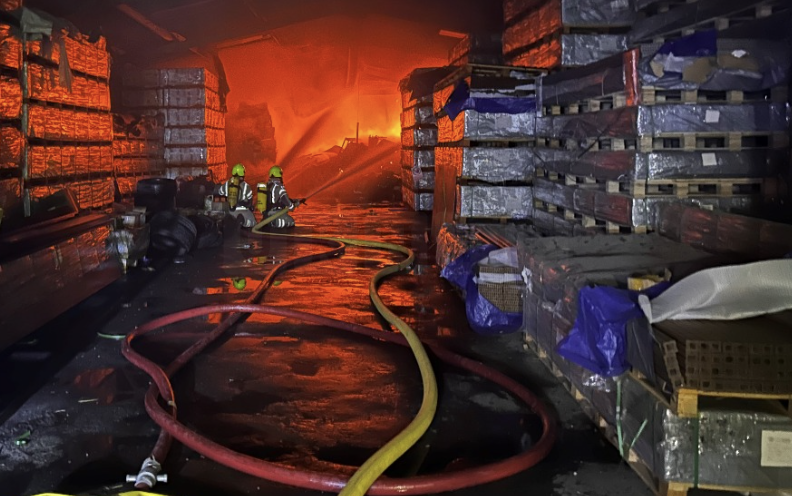 Surrey Fire & Rescue Service has mobilized a significant response to a fire reported at a farm on Norwood Hill Road in Charlwood