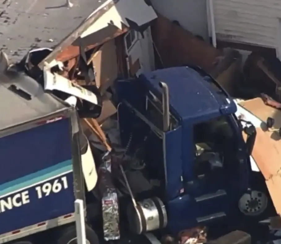 Large Tractor-Trailer Crashes into Home, Causing Major Property Damage in Carteret