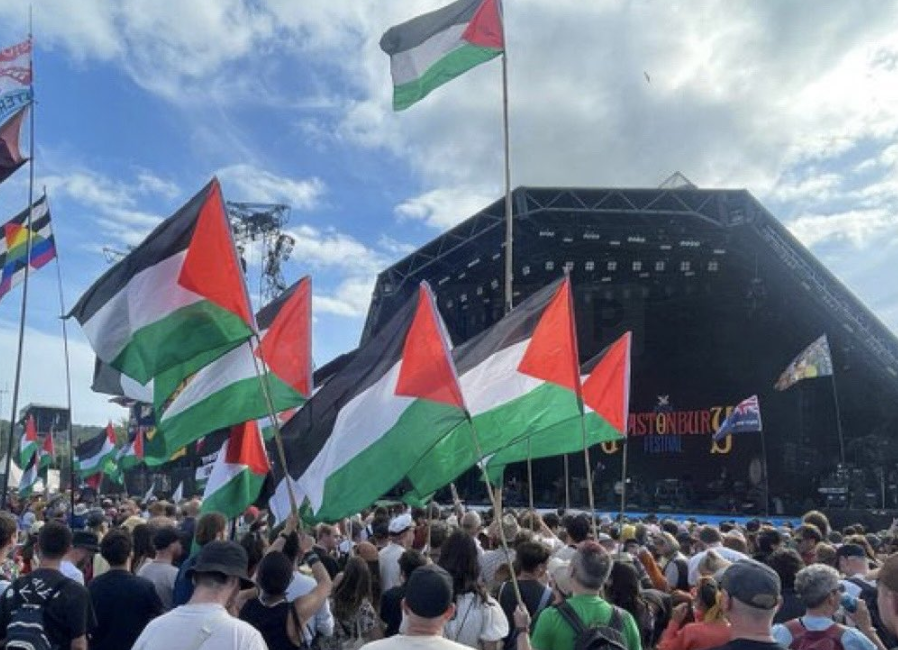 Controversy Erupts as Glastonbury Attendees Display Palestinian Flags and Merch