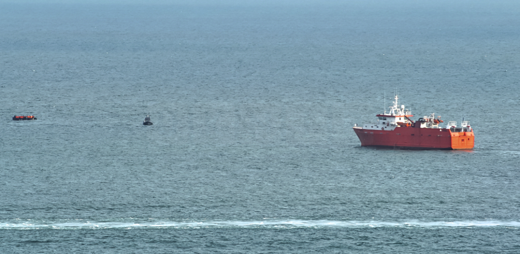 French Police in Tense Standoff with Migrant Boats in the English Channel