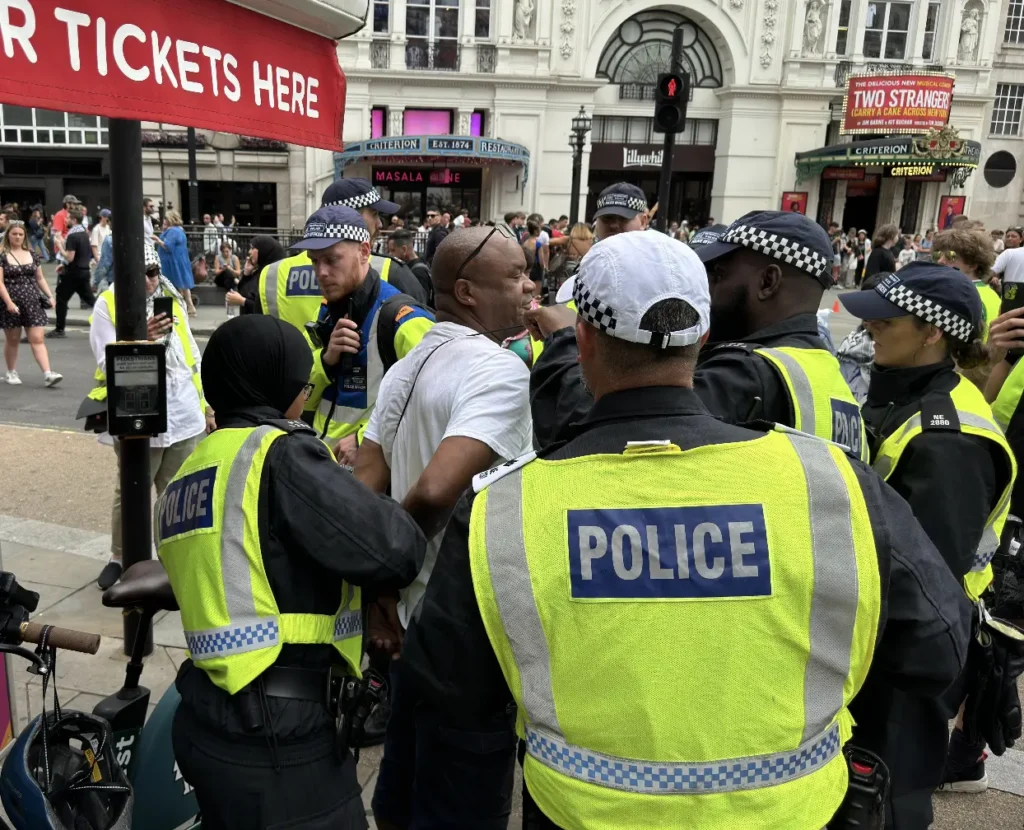 Britain’s Riot Carnage Deepens: Police Injured Amid Violent Clashes in Liverpool and Manchester