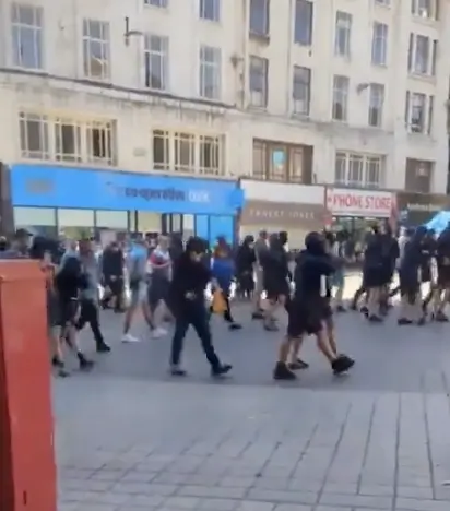 Britain’s Riot Carnage Deepens: Police Injured Amid Violent Clashes in Liverpool and Manchester