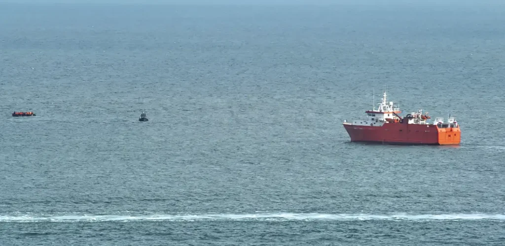 French Police in Tense Standoff with Migrant Boats in the English Channel