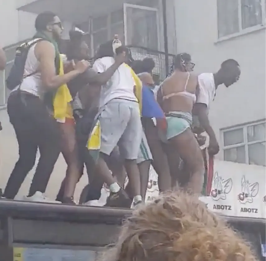 Chaos at Notting Hill Carnival: Group of Youths Smash Bus Shelter While Twerking