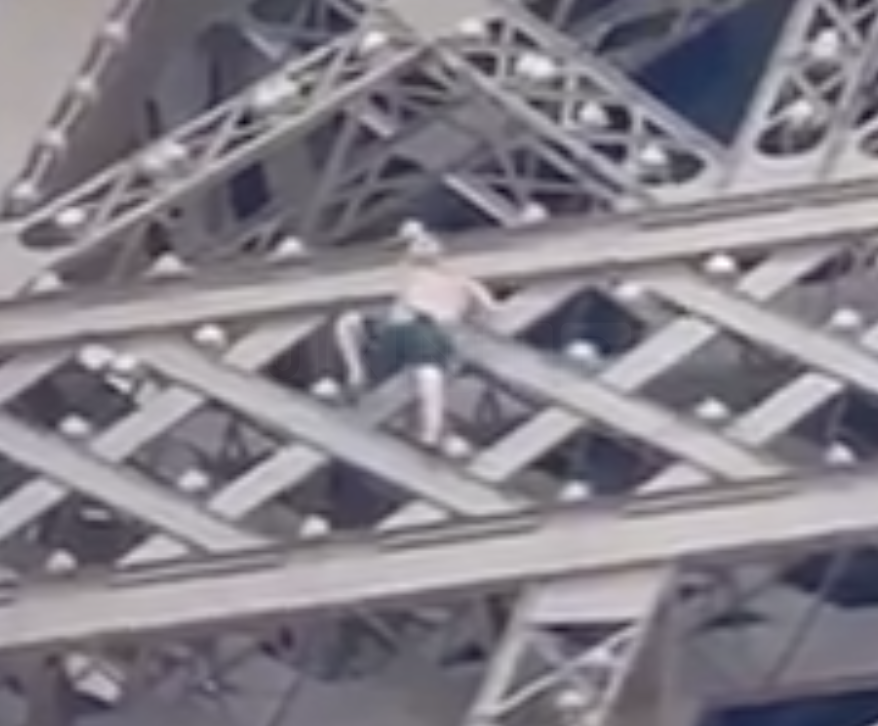WATCH: Eiffel Tower Evacuated After Man Climbs Landmark Ahead of Olympics Closing Ceremony