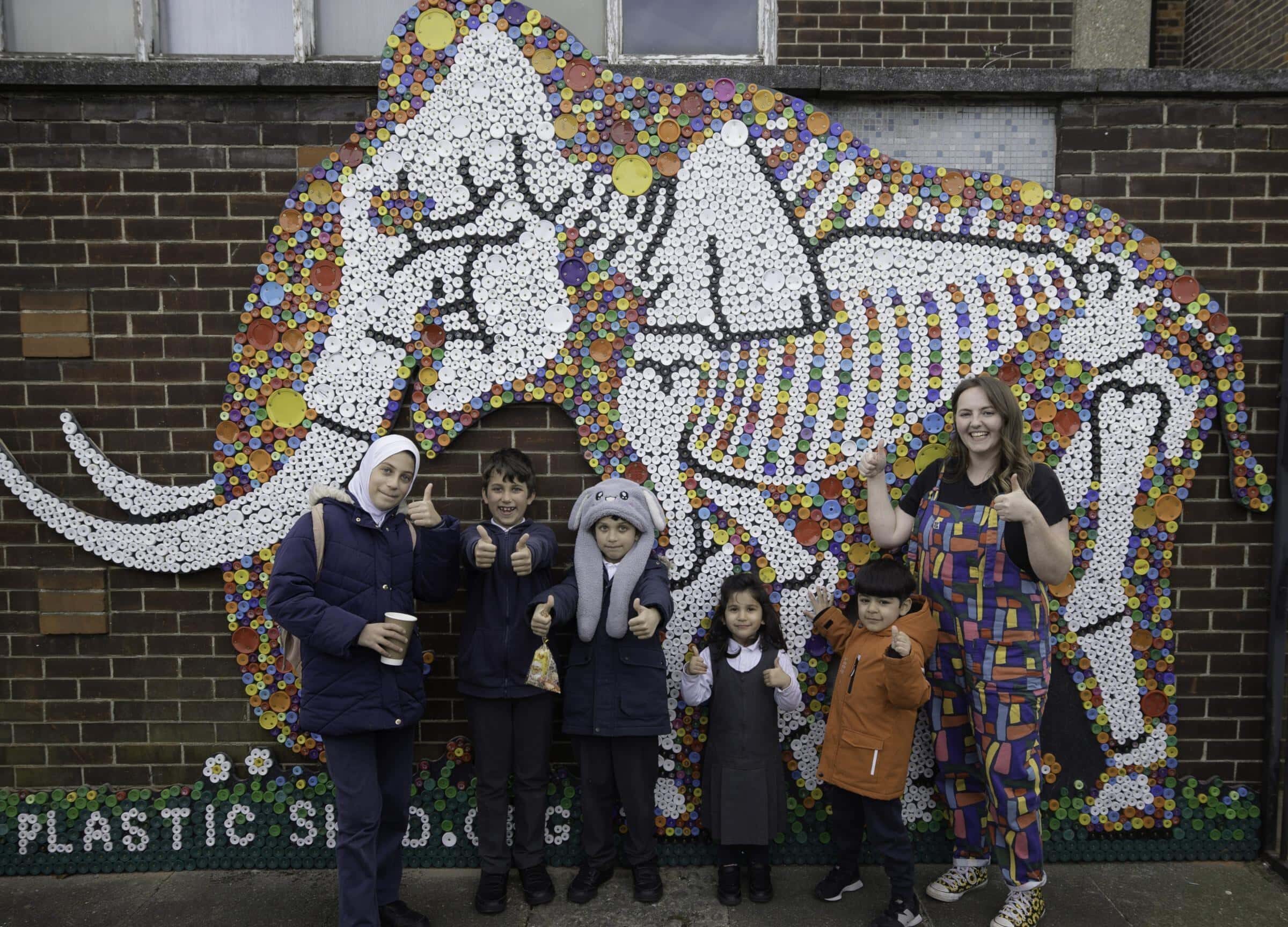 Ilford Pupils Bring Prehistoric Mammoth Back to Life with Colourful Bottle-Top Mural
