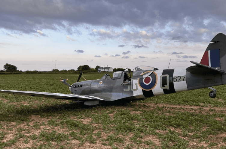 Spitfire Crash Lands in Crop Field in West Hythe: Pilot and Passenger Walk Away Unhurt