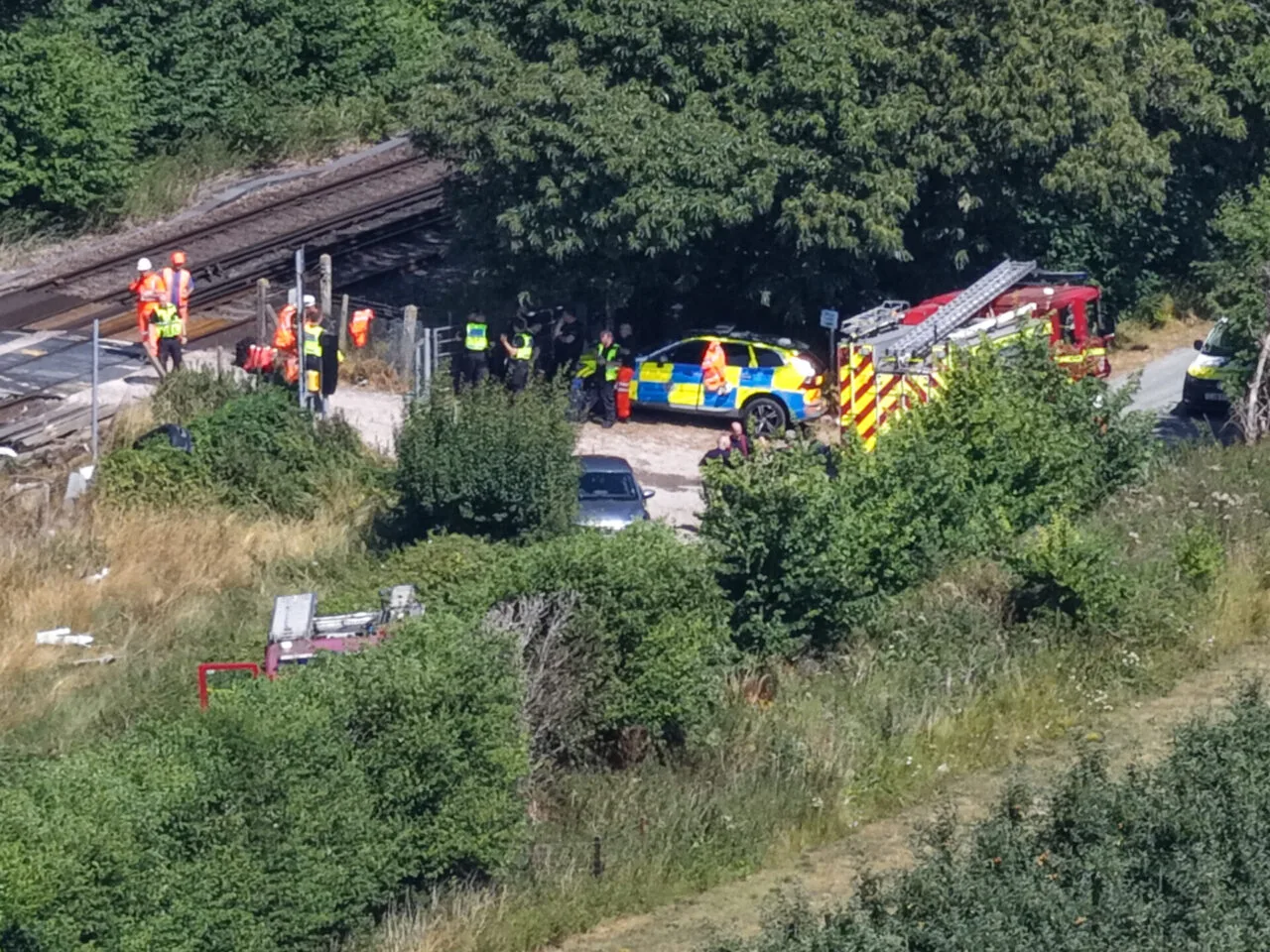 Amazon Driver Killed After Train Hits Van at Teynham Level Crossing – 200 Passengers Evacuated