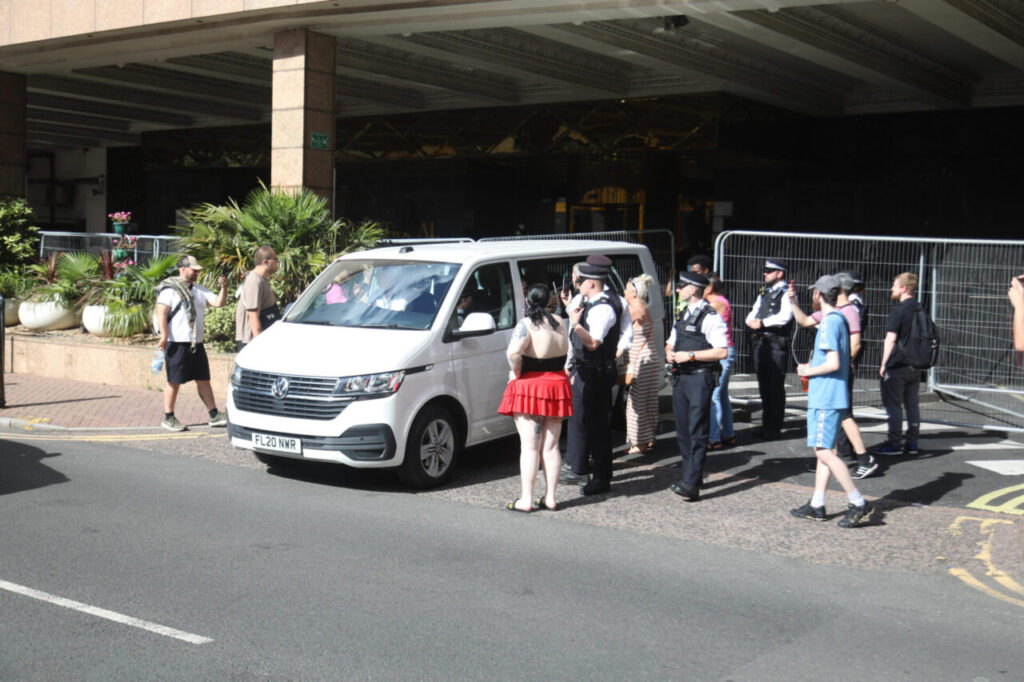 Police Intervene as Taxis Remove Migrants from Britannia Hotel in East London