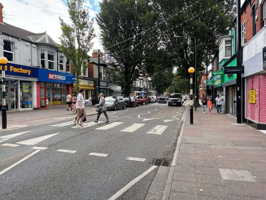 Suspect in Custody as Police Hunt Witnesses