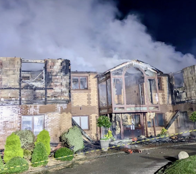 Around 60 firefighters at scene of golf club blaze as building destroyed