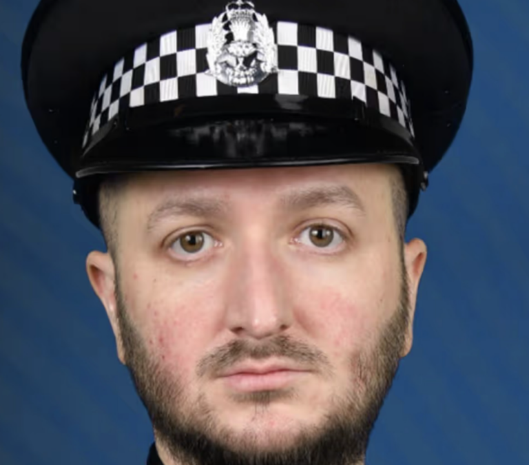 Hero Cop Battles Smoke to Save Suspect in Lanarkshire Flat image