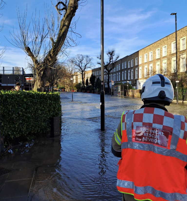 Blast of Water Burst Main Floods Busy Islington Road in London image