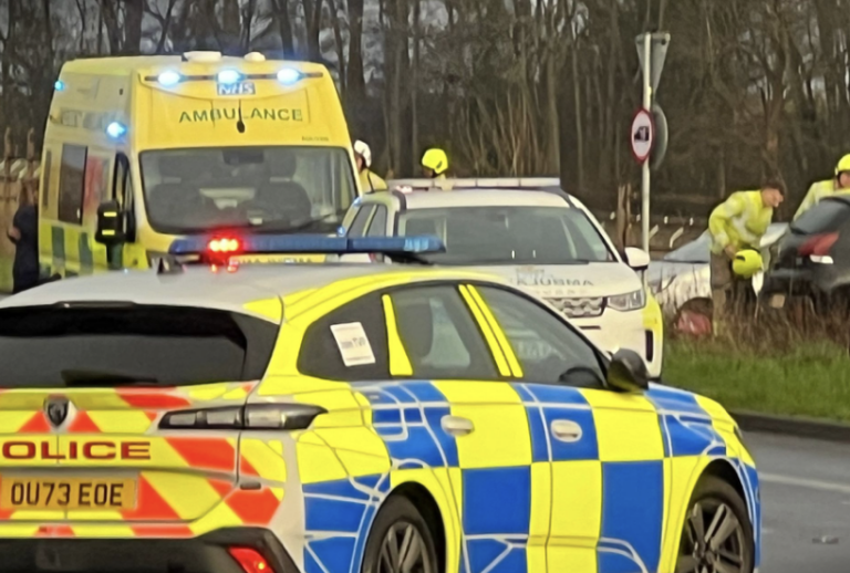 Chaos on Millennium Way After Crash in Woodley image