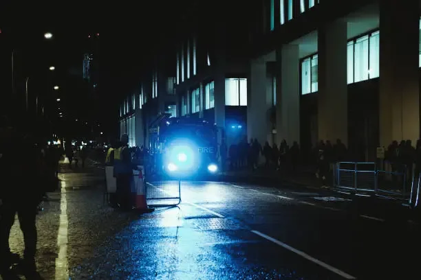 Victoria Street, London UK 31st December 2022 (01st January 2023) New Year´s Day in London New Year's Eve on Victoria Street at Westminster Abbey, an Anglican church. A fire engine, New Year's Day in London: New Year's Eve celebrations, Victoria Street, Westminster Abbey, London Eye, City Of Westminster, Central London England, Britain, UK, Night, Street