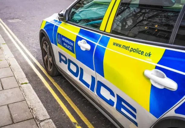 London, UK Side view of a Met Polce car, parked on a street in central London