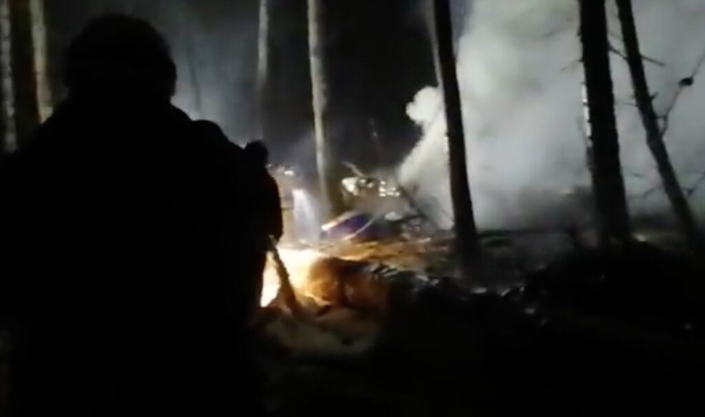 An 12 Cargo Plane That Crashed In The Irkutsk Region In Eastern Siberia Caught Fire When Hitting The Ground