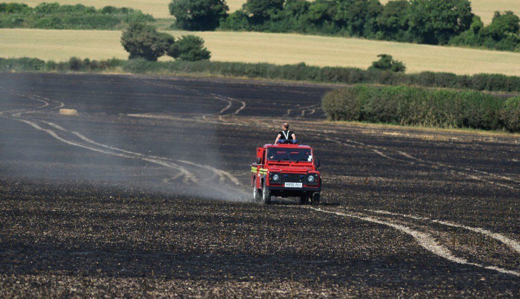 Firefighters  called to a 60-acre field of standing crops near Winchester