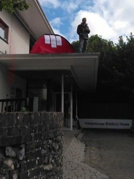 Roof-top protester sees second night on Winchester roof