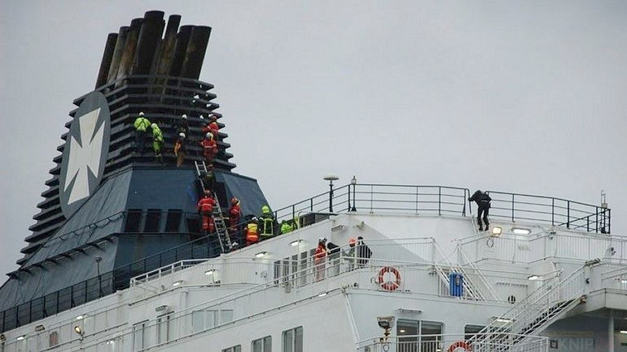 Forty migrants arrested who climbed aboard a ferry