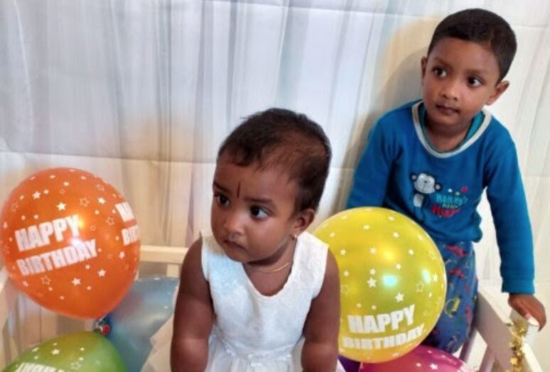 A man has been charged by officers investigating the deaths of two children in Ilford