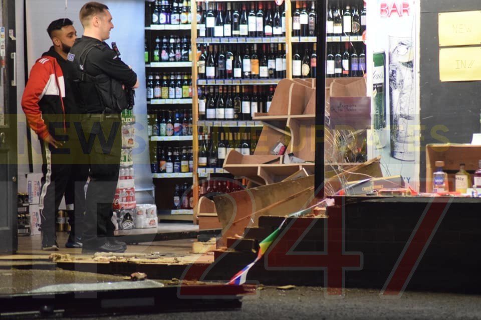 Pensioner ploughs into wine shop
