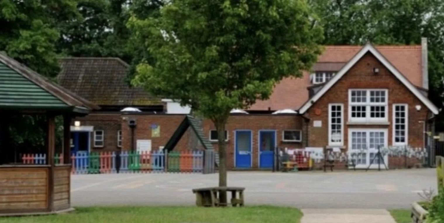 Man in 20s Arrested for Harassment Outside Surrey Primary School