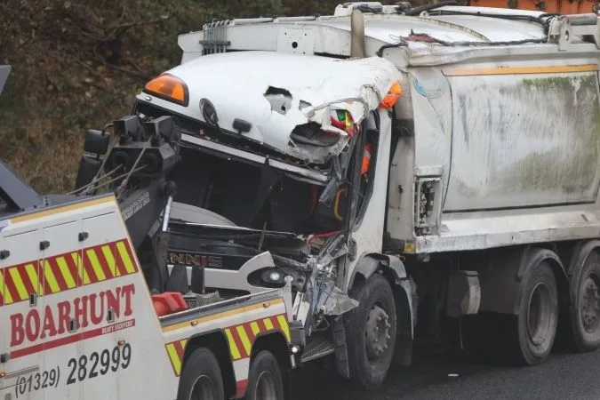 M27 Chaos Near Portsmouth: Council Dustcart Crash Injures Three and Closes Lanes