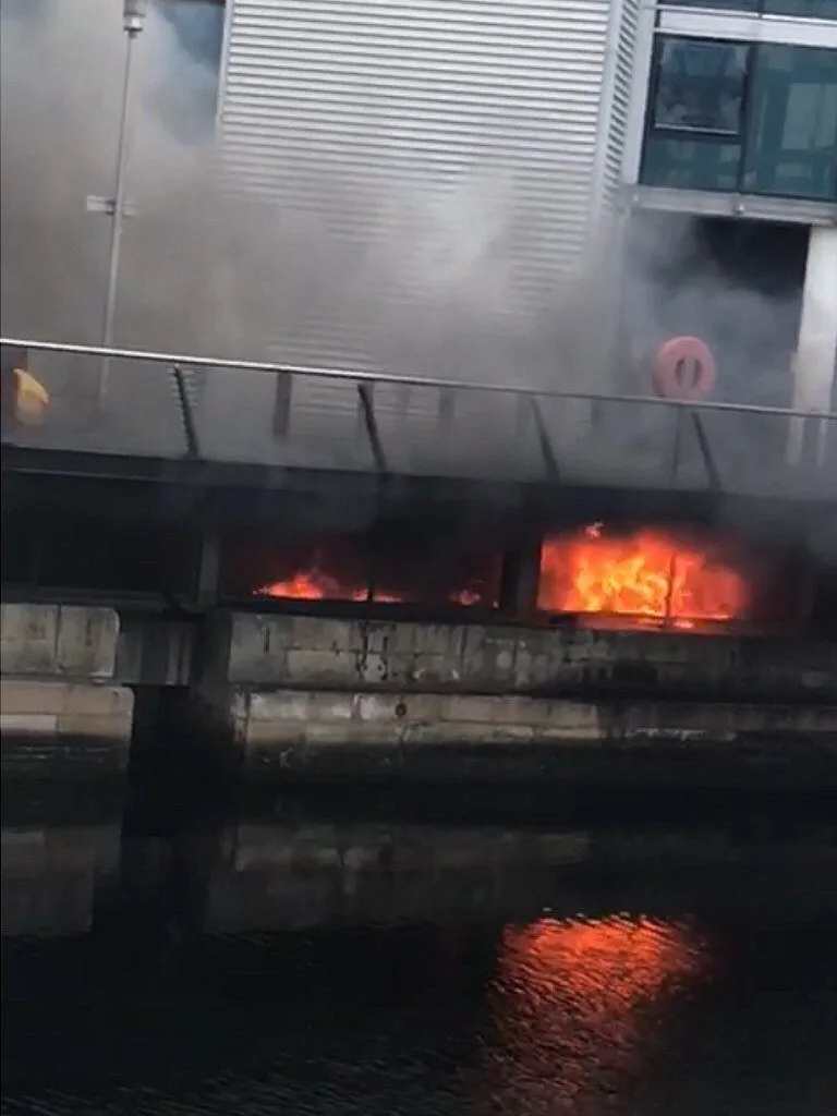 Person hospitalised after Car Park fire destroys five vehicles in Chatham