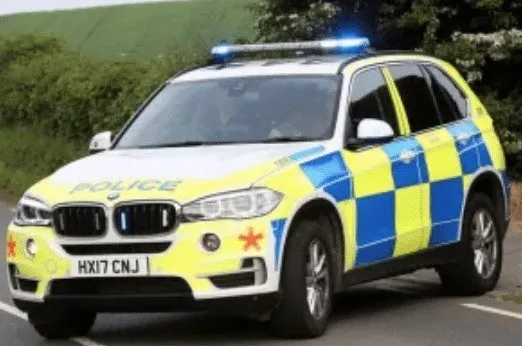 Car on its roof Closes Middle Road near  Calbourne Mill on the Isle of Wight