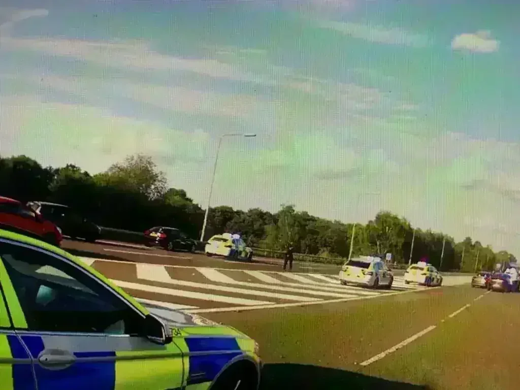 Two Arrested After High-Speed Stolen Car Chase on M3 Ends with Police Boxing Tactic