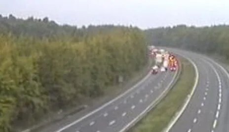 The M25 is closed after a crane has been in Collision with a Road sweeper