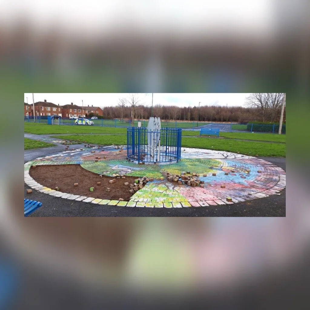 Police are appealing after a group of youths reportedly ripped up bricks from a mural and threw them around