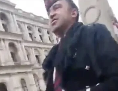 Disgraceful piper who attempted to barge through a police cordon on Remembrance Sunday charged with assault