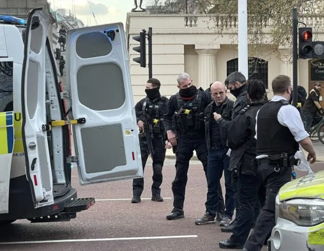 A man who was arrested after being found in possession of an axe on The Mall has been charged