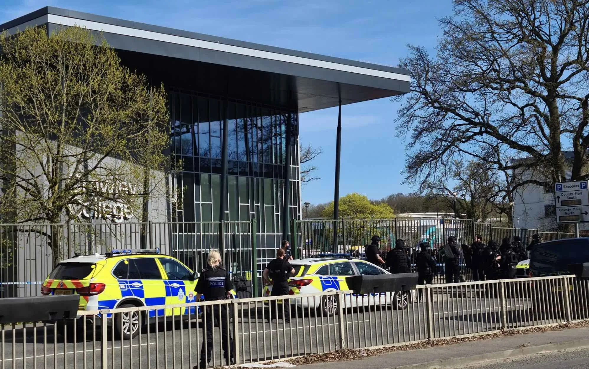 Shots Fired Near Crawley College: Teacher Injured, Man Arrested in Police Lockdown