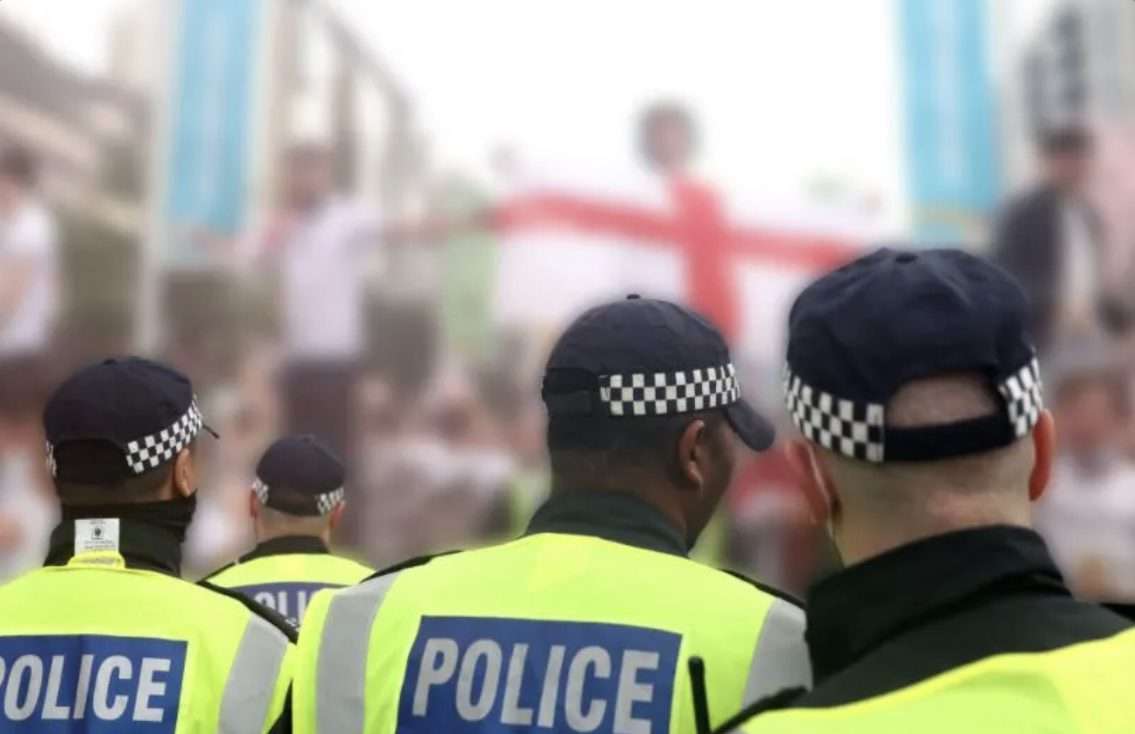 Police charge two men over Wembley staff pass thefts
