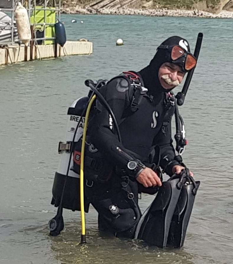 Searches are continuing for a diver who went missing off the coast of Lulworth in Purbeck