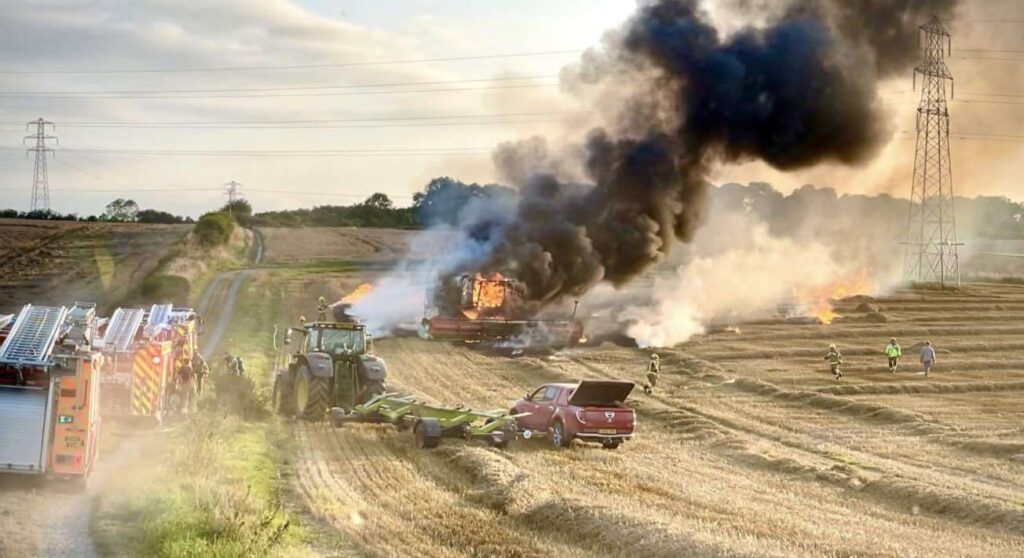 Combine Harvester Destroyed in Fiery Blaze – Firefighters Rescue Crop Fields from Disaster