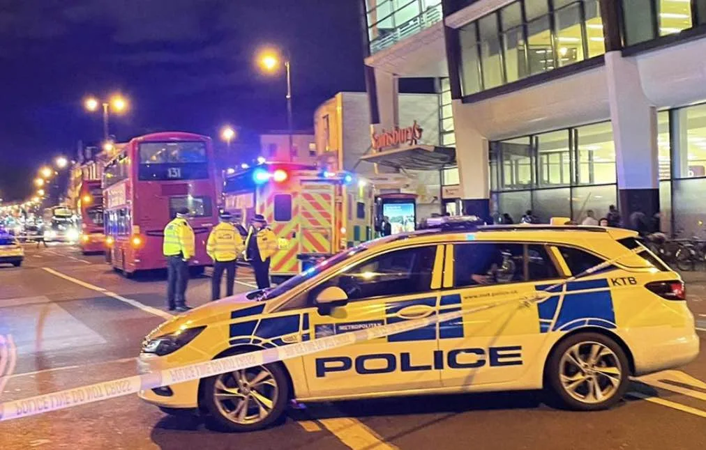 A man  has been arrested on suspicion of possession of criminal property and a woman  has been taken to hospital after a collision on Tooting