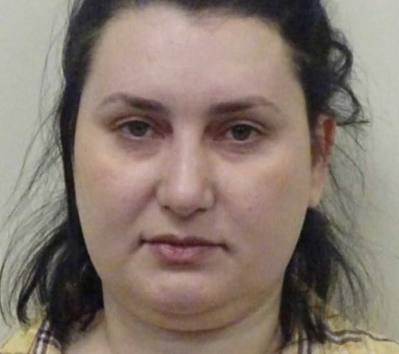 A woman who slit the throat of a seven-year-old girl as she played in a park has lost an appeal against her sentence.