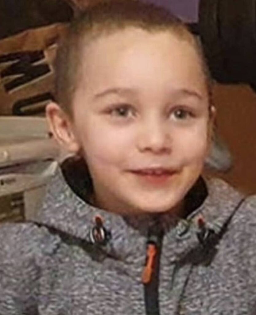 A woman accused of murdering her five-year-old son told police she did not recognise him in hospital because of his injuries, a court has heard