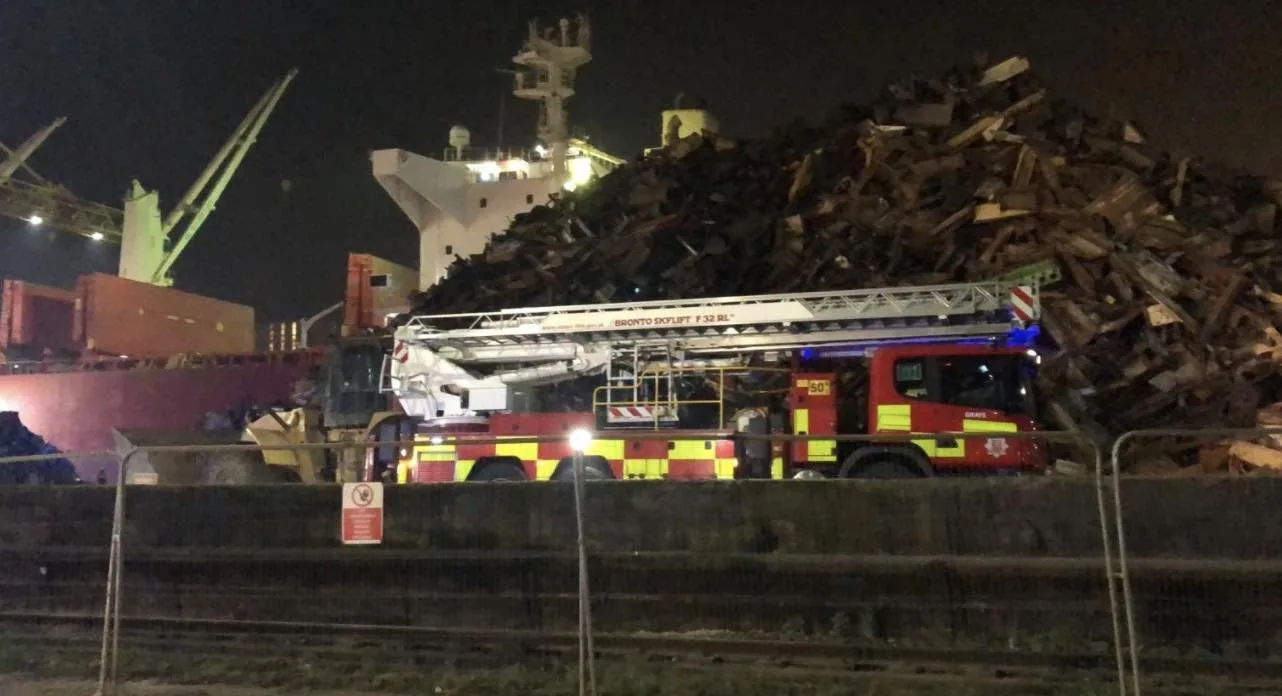 Firefighters are dealing with a small fire on board a ship at Tilbury Docks