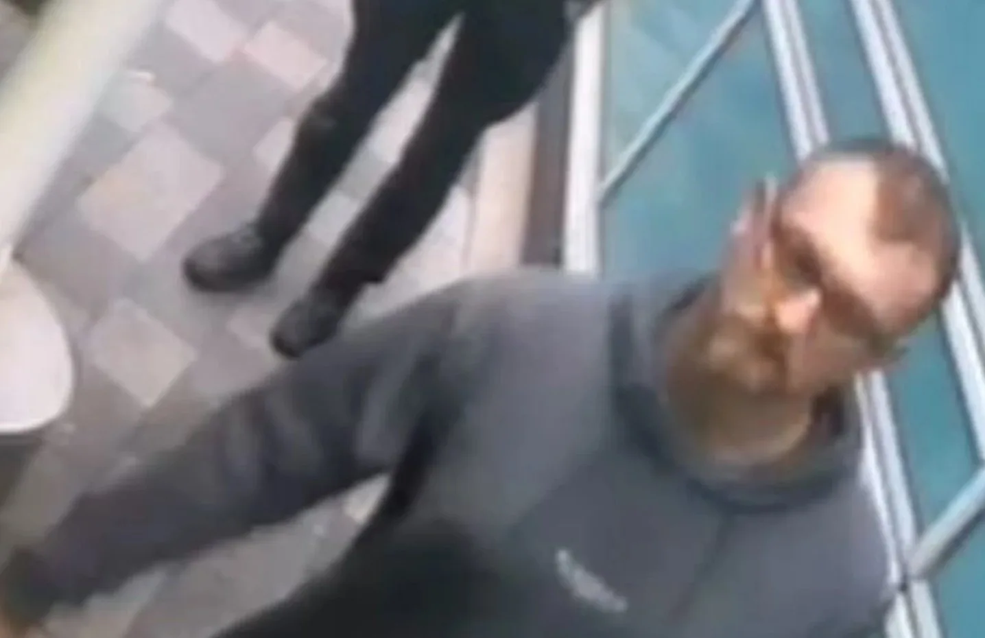 Officers investigating an assault on an ambulance crew member are appealing for help to identify a man they wish to speak with