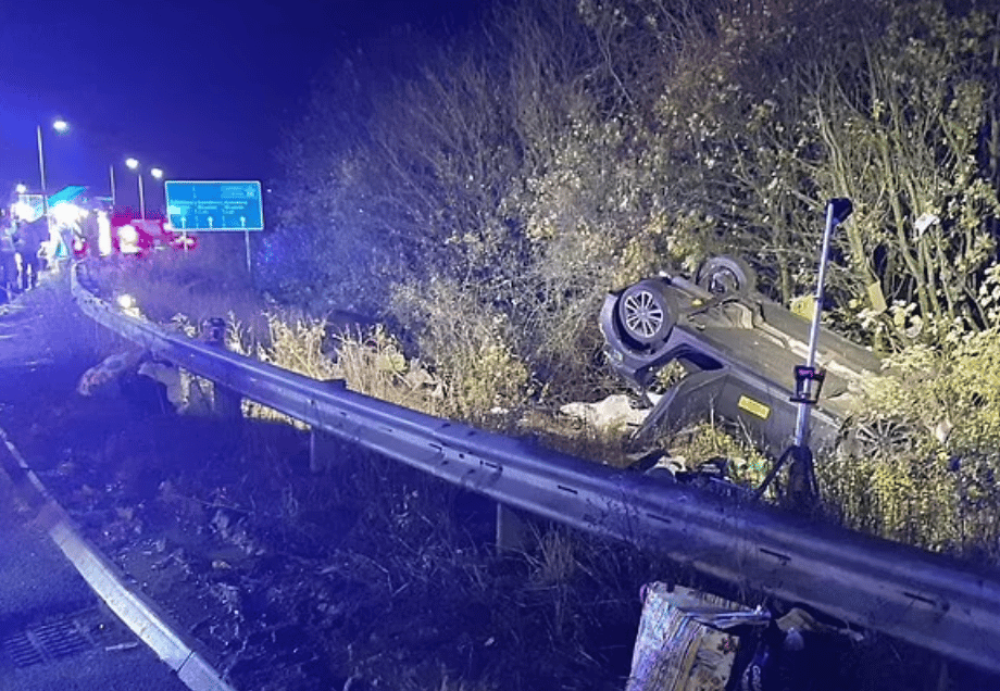 A woman high on cannabis escaped a 100-mph crash without injury after rolling her car on a roundabout and flying over a crash barrier
