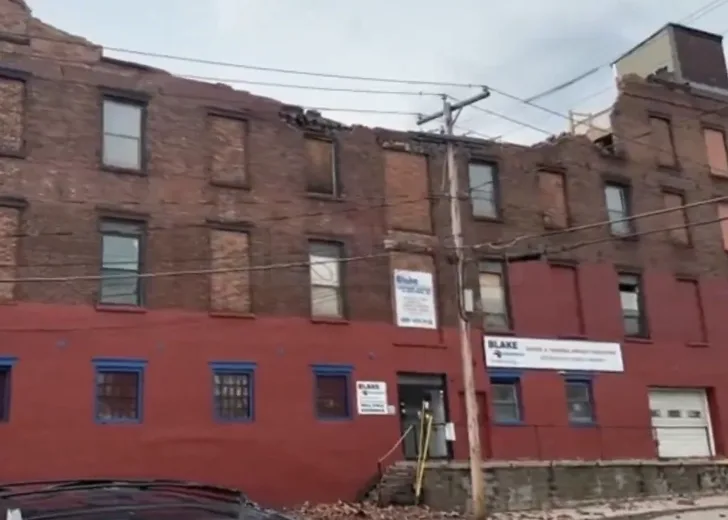 Storm Fury Tears Through Albany: Four-Storey Building Partially Collapses Amid 10,000-Home Blackout