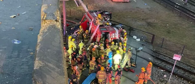 Dallas Fire Engine Plunges Off Bridge on I-345, Four Firefighters Injured in Morning Crash