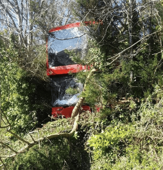 Electric Double-Decker Bus Crashes Into Woods Near Biggin Hill Airport – No One Trapped, Road Still Closed