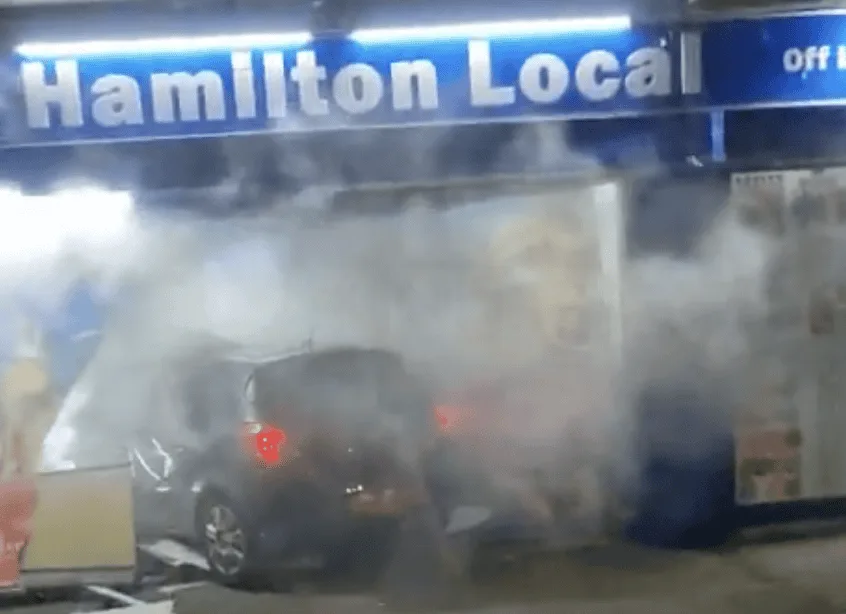 Feltham Car Ploughs Into Shopfront and Bursts Into Flames – No Serious Injuries as Fire Brigade Tackles Blaze