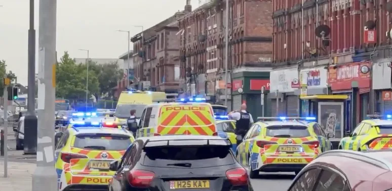 Murder Probe Underway After Woman Stabbed to Death in Merseyside Shop – Suspect Held